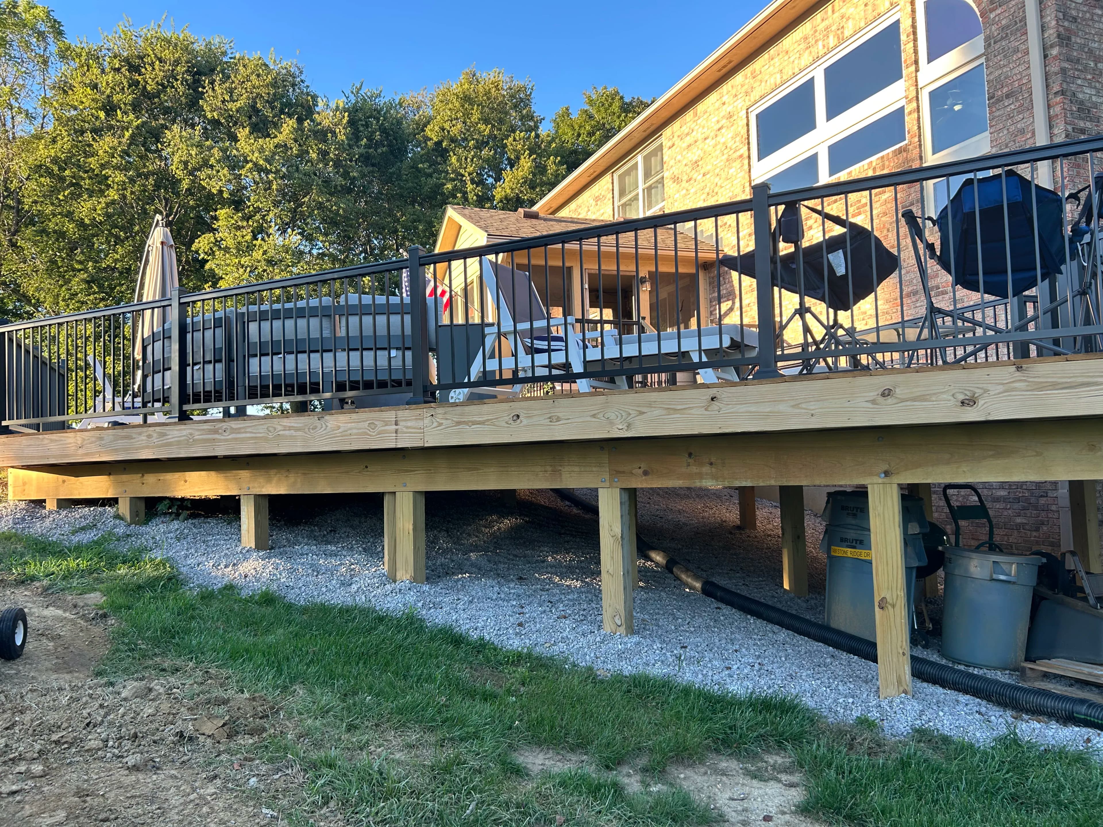 Project Gravel Under the Deck and Fresh Mulch Beds at the Driveway image