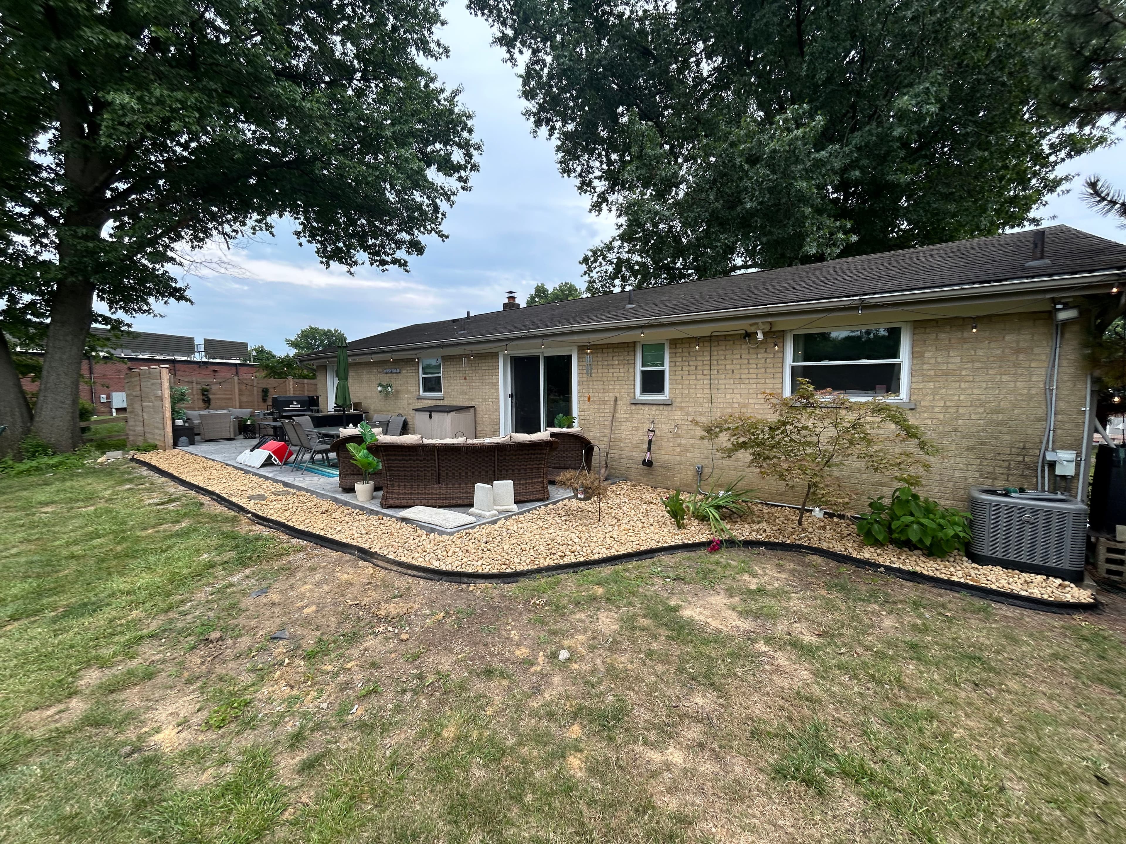 Project Landscape Border Repairs, Fresh Rock and Gravel Driveway Work Done Right image