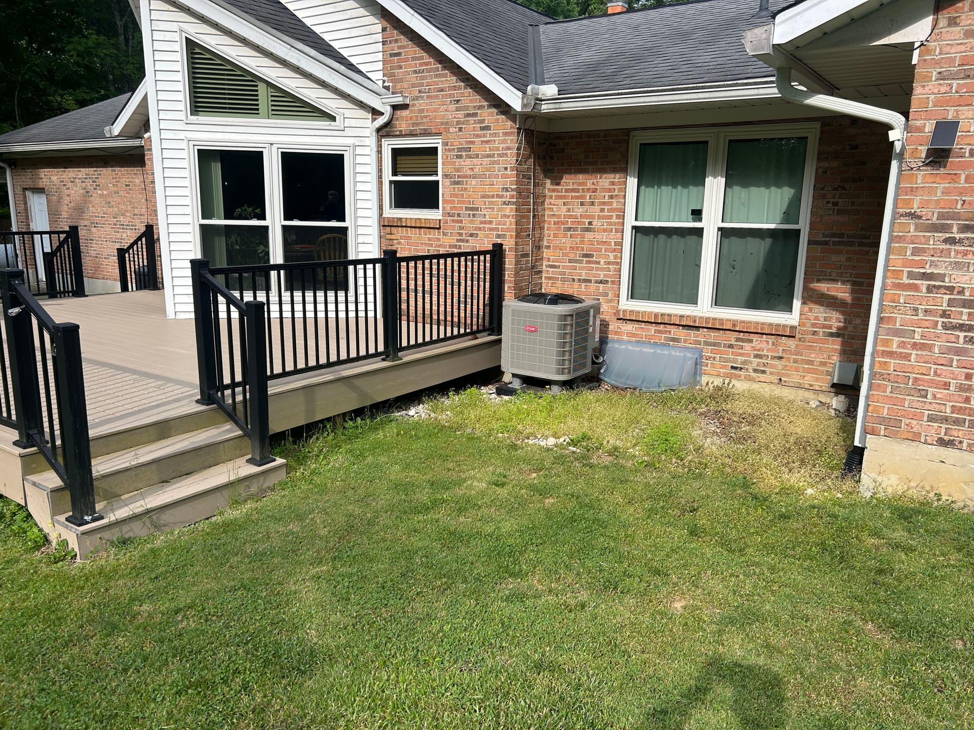 Sidewalk Extension, Paver Work, and Rock Bed Upgrade for Cleaner Curb Appeal