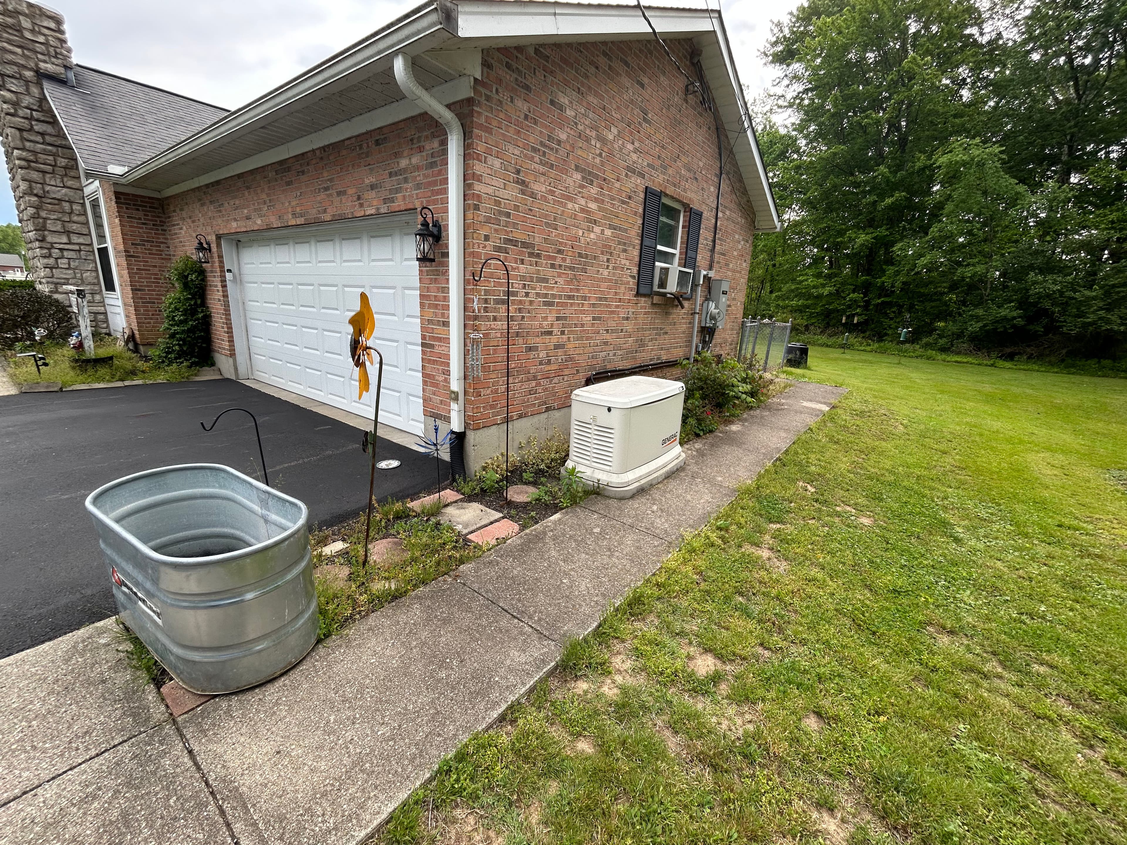 Project Sidewalk Extension, Paver Work, and Rock Bed Upgrade for Cleaner Curb Appeal image