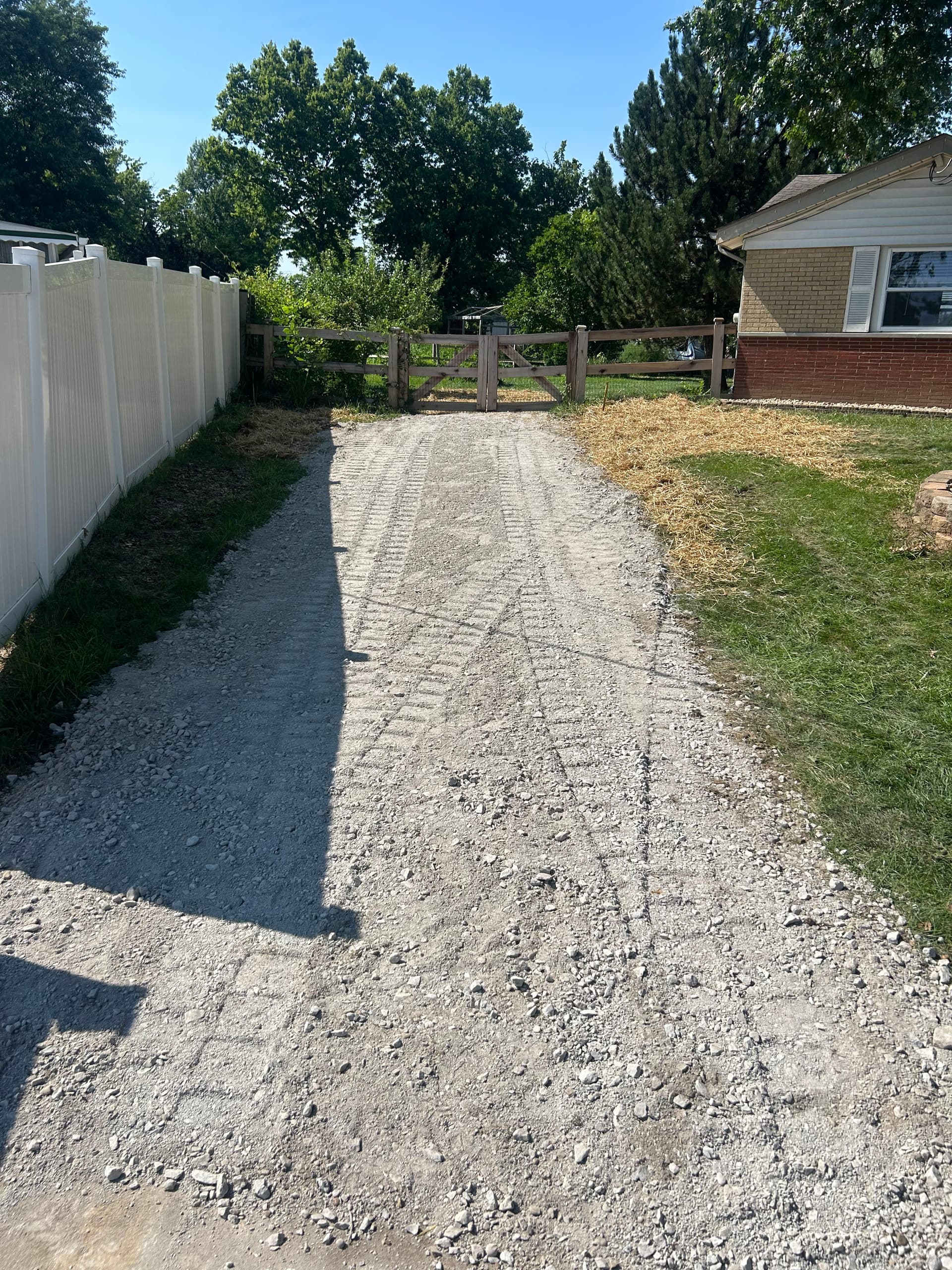 Gallery photos for Landscape Border Repairs, Fresh Rock and Gravel Driveway Work Done Right: Image #3