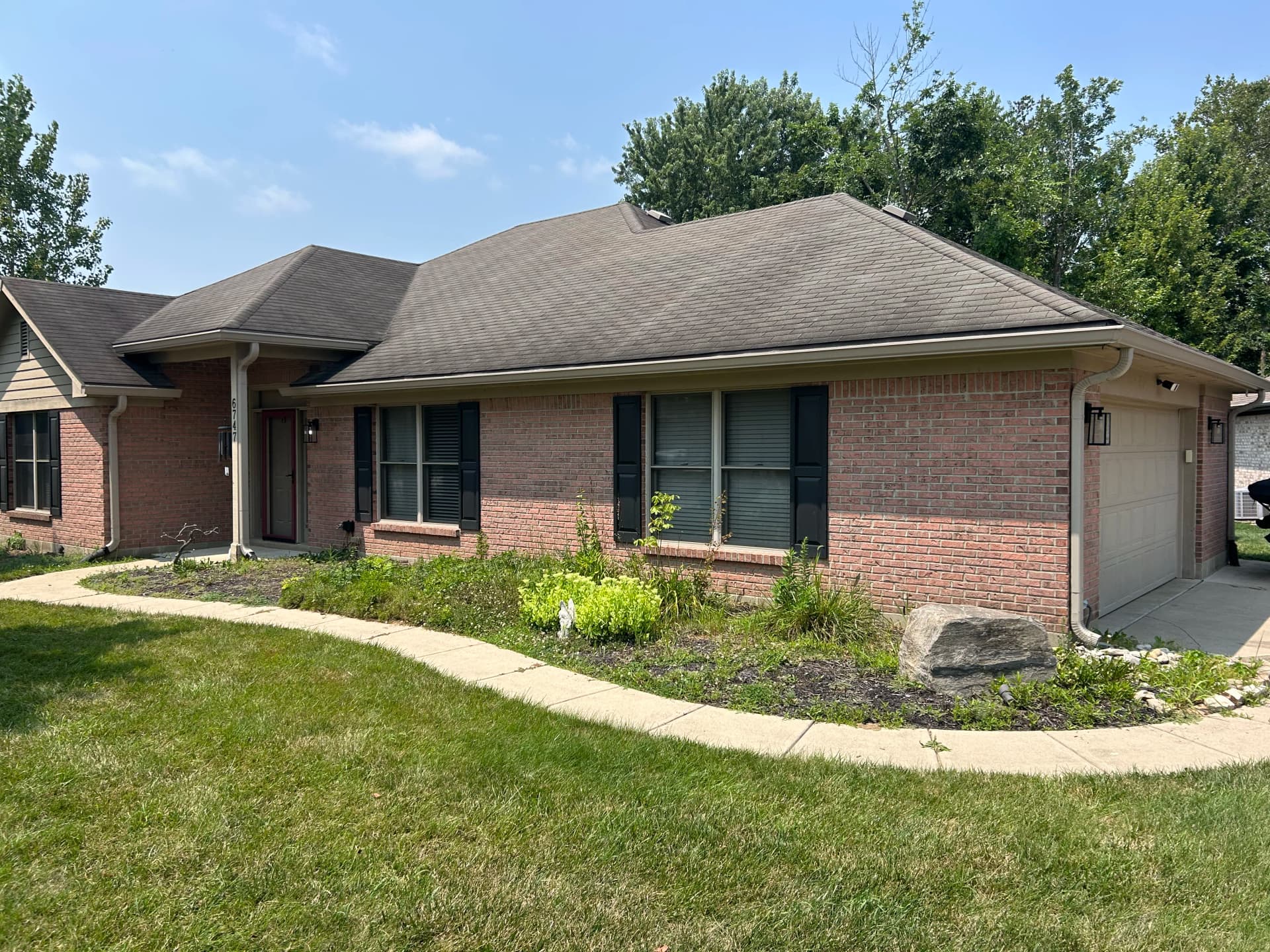 Fresh Mulch and Clean Beds Change the Whole Feel of a Home image